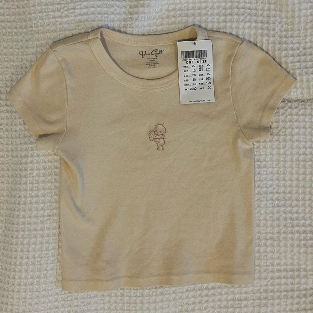 Brandy Melville Cream Baby Tee with Embroidered Graphic